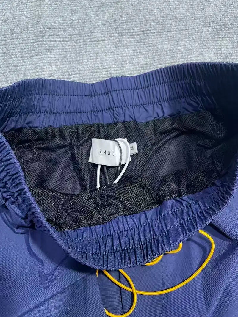 High street fashion RHUDE letter printed hip-hop casual pants beach pants men's five quarter shorts